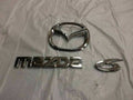 203-2008 Mazda Trunk Emblem Set 910.MZ1S07
