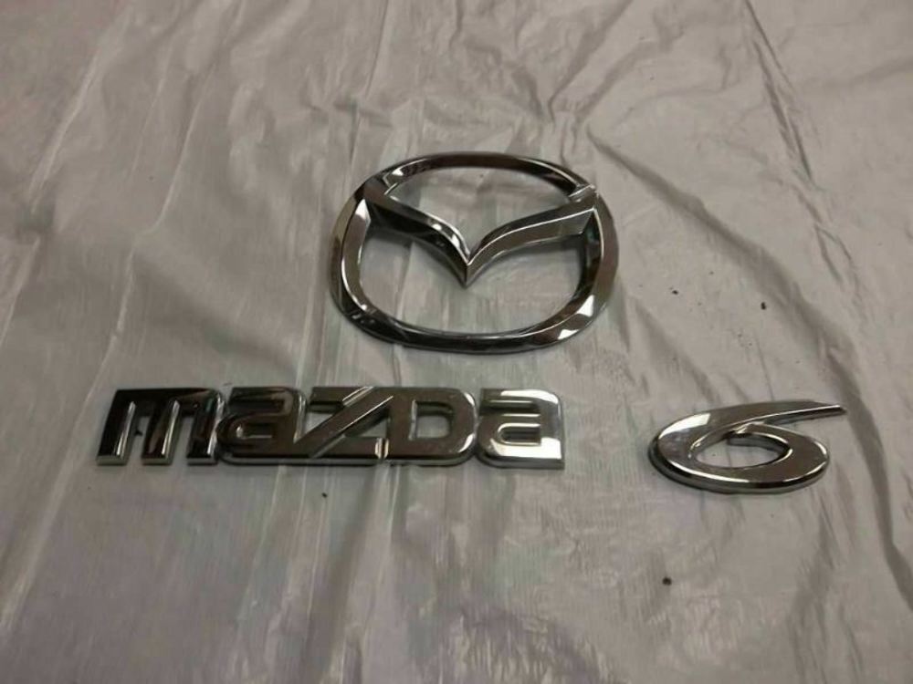 203-2008 Mazda Trunk Emblem Set 910.MZ1S07