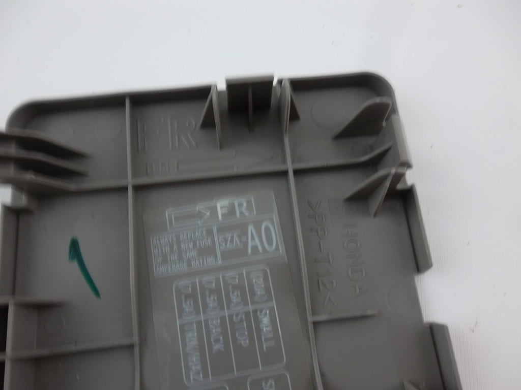 2009-2015 Honda Pilot Aux Fuse Lid Cover  84683-SZA-A01